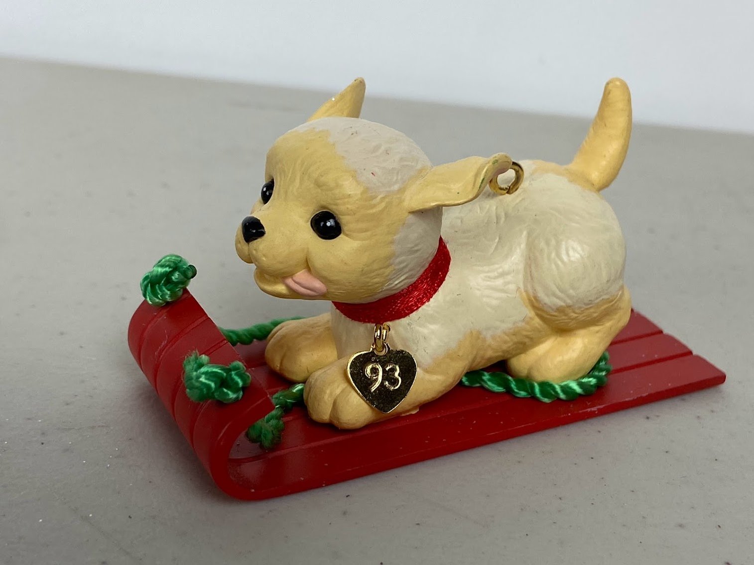 Hallmark 1993 Puppy Love Golden Retriever on a red sled NO.3 in collectors series- no box