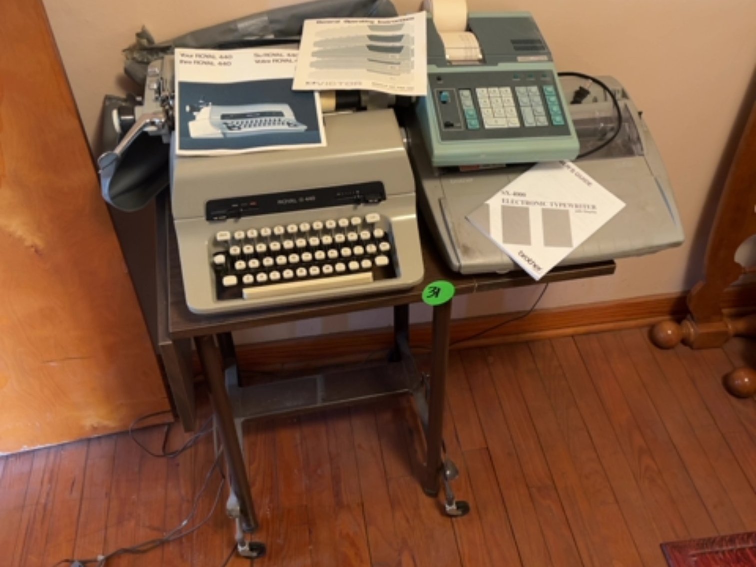 Type Writers, Calculator And A Type Writer Table