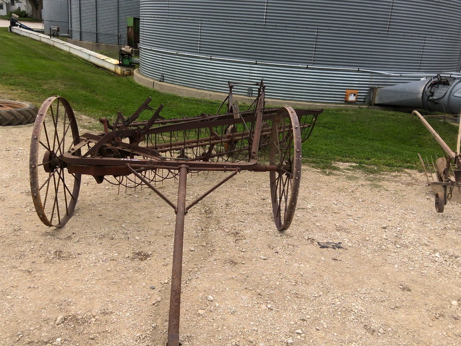 Antique side discharge rake
