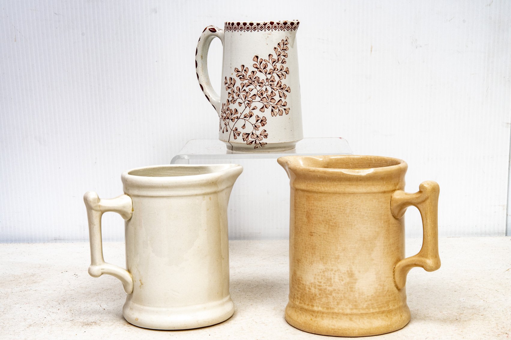 3 White Vintage Pottery Pitchers