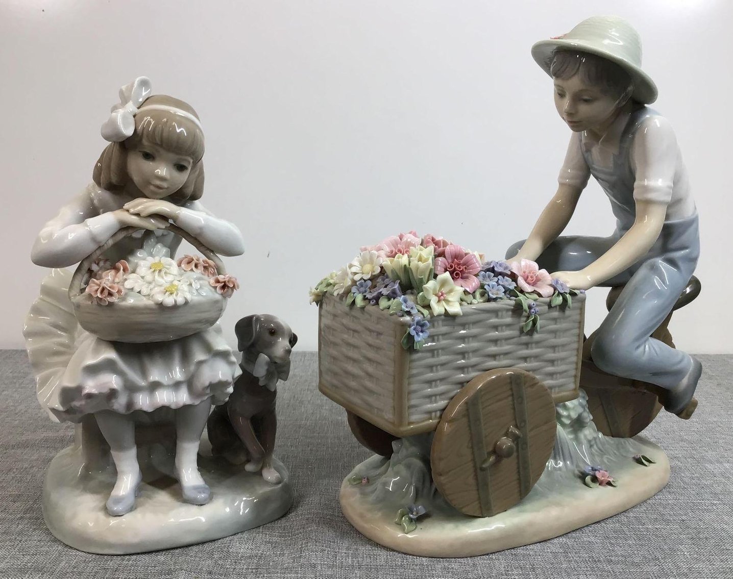 Image for Lladro Boy with Tricycle and Flowers and Lladro Girl with Flowers