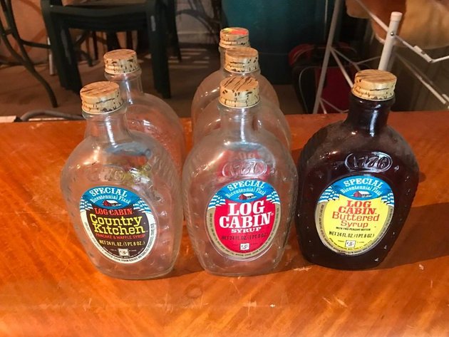6 LOG CABIN GLASS BOTTLES