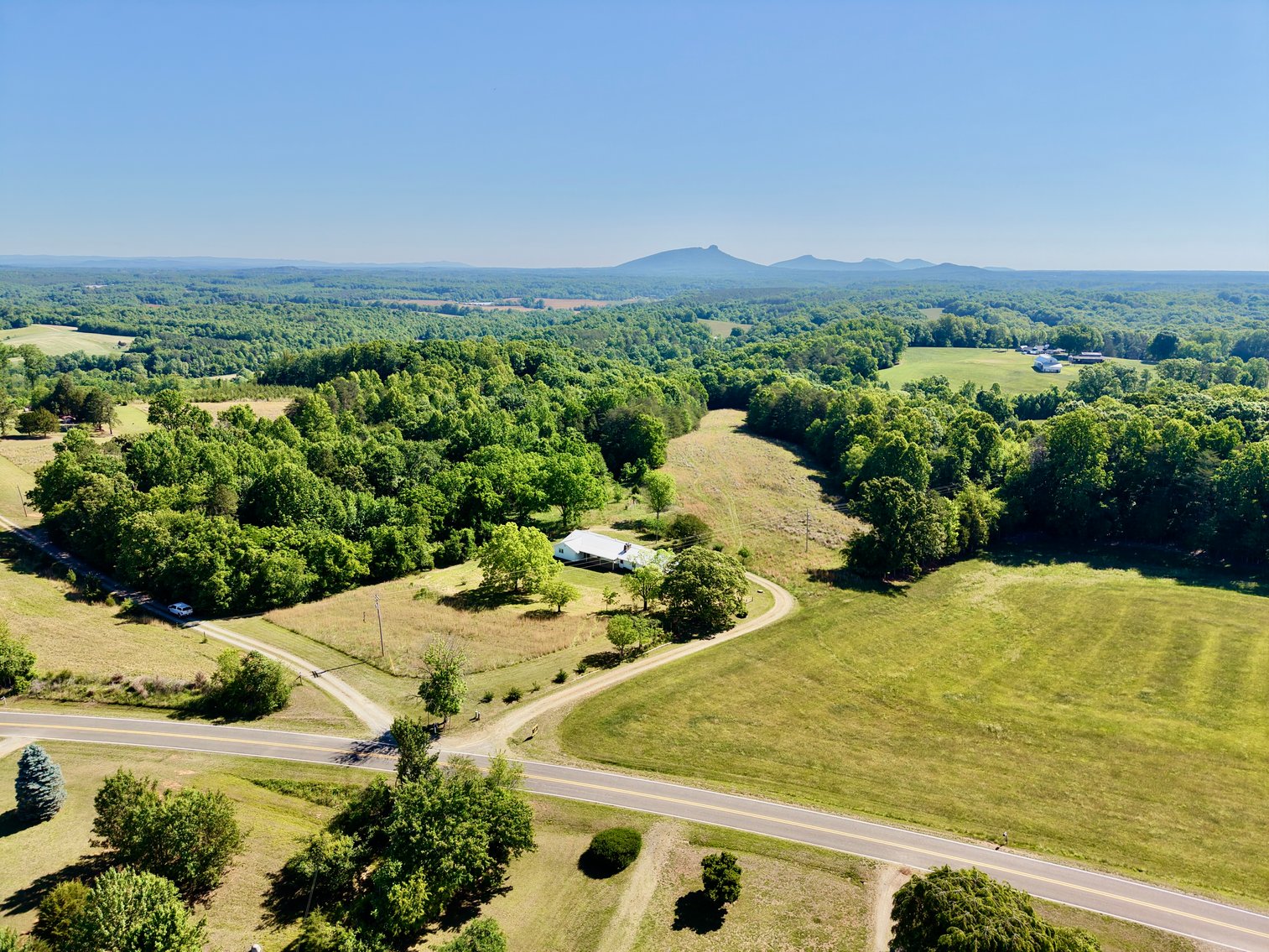 JUDICIAL AUCTION - 14.9 +/- Acres and Home with Pilot Mountain Views in Boonville, NC