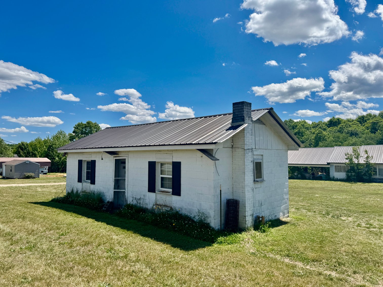 JUDICIAL AUCTION - .91 +/- Acres andTwo Homes with NC Hwy. 16 Frontage in Taylorsville, NC