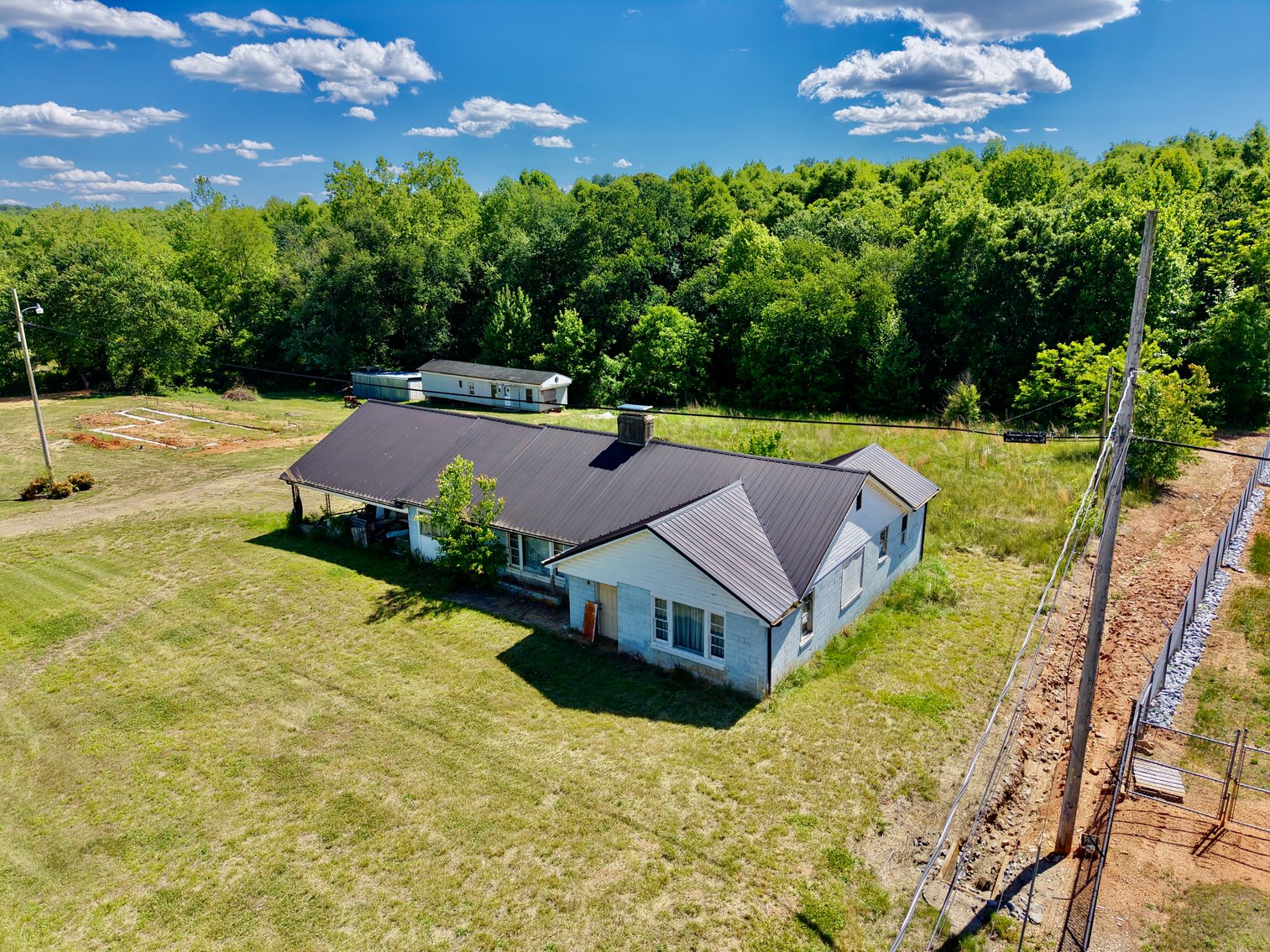JUDICIAL AUCTION - .91 +/- Acres, Home and Office with NC Hwy. 16 Frontage in Taylorsville, NC