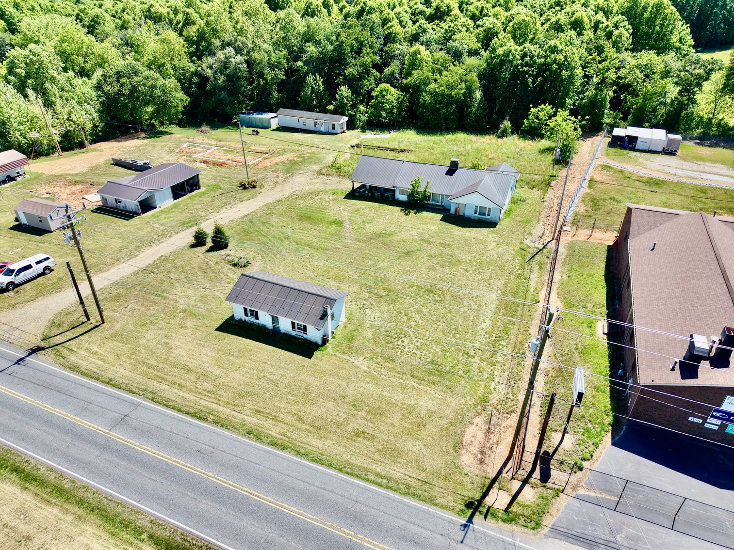 JUDICIAL AUCTION - .91 +/- Acres, Home and Office with NC Hwy. 16 Frontage in Taylorsville, NC