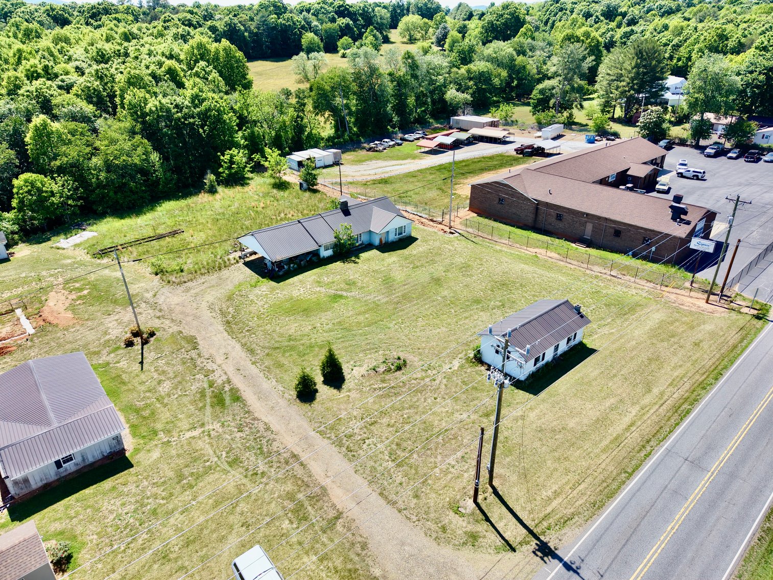 JUDICIAL AUCTION - .91 +/- Acres, Home and Office with NC Hwy. 16 Frontage in Taylorsville, NC
