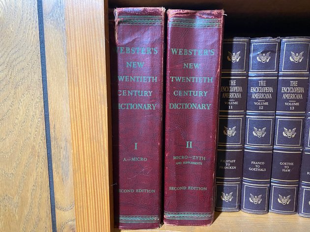 Image for Contents of (2) Shelves Including Vintage Partial Set of Encyclopedia Americana Encyclopedia's and (2) Webster Dictionaries