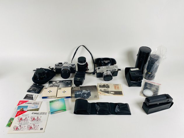 Image for (14) Vintage Canon Cameras, Flashes, Lens, and Other Accessories