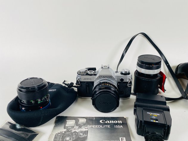 Image for (14) Vintage Canon Cameras, Flashes, Lens, and Other Accessories