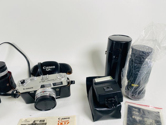 Image for (14) Vintage Canon Cameras, Flashes, Lens, and Other Accessories