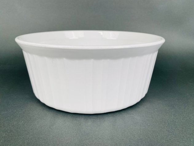 Image for White Casserole Dish with Chrome Holder, (4) Modern Bowls, Sugar Packet Holder, Round Corning Ware Casserole, (4) Butter Pats, (6) White Ceramic Napkin Rings, and Round Condiment Bowl