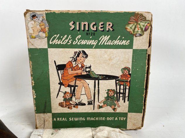 Image for Antique Collectibles Including Antique Baby Gown and Bonnett, Vintage Singer Sewing Machine, Antique Jewelry and Purses and More!