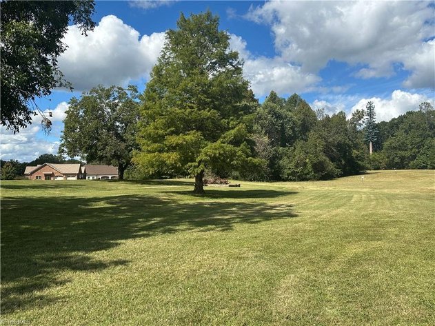 Home For Sale in Oakridge - 8410 Linville Road