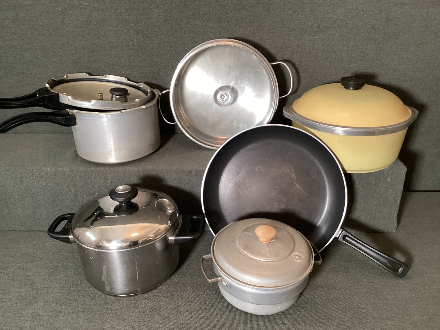 Image for Assorted pots and pans, including a pressure cooker