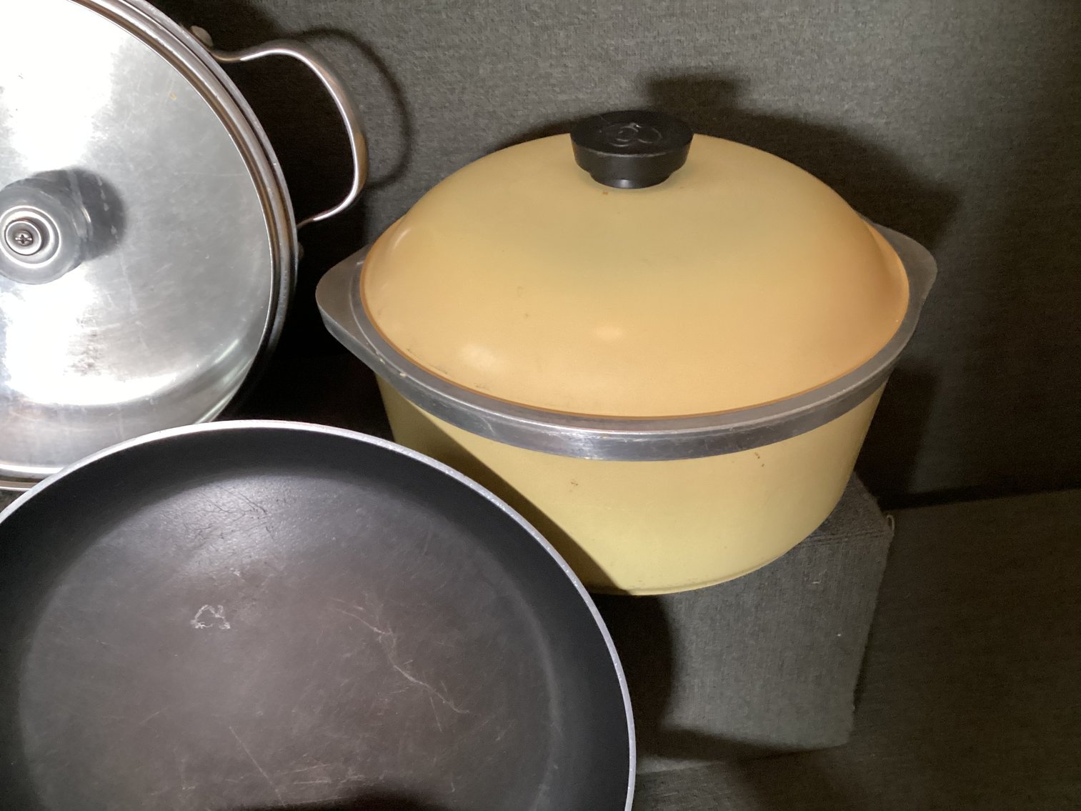 Image for Assorted pots and pans, including a pressure cooker
