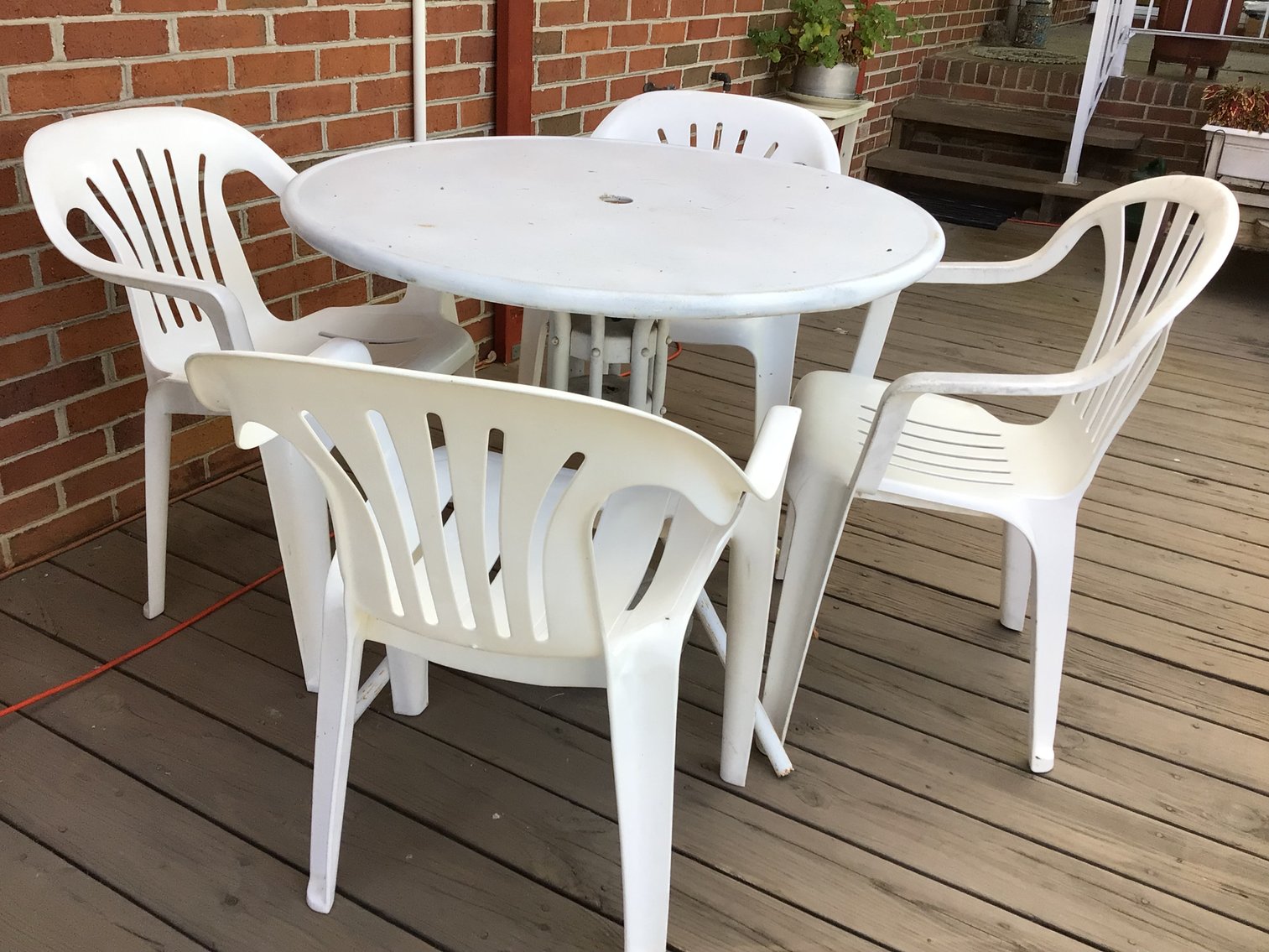 Image for Patio Table and 4 Plastic Chairs