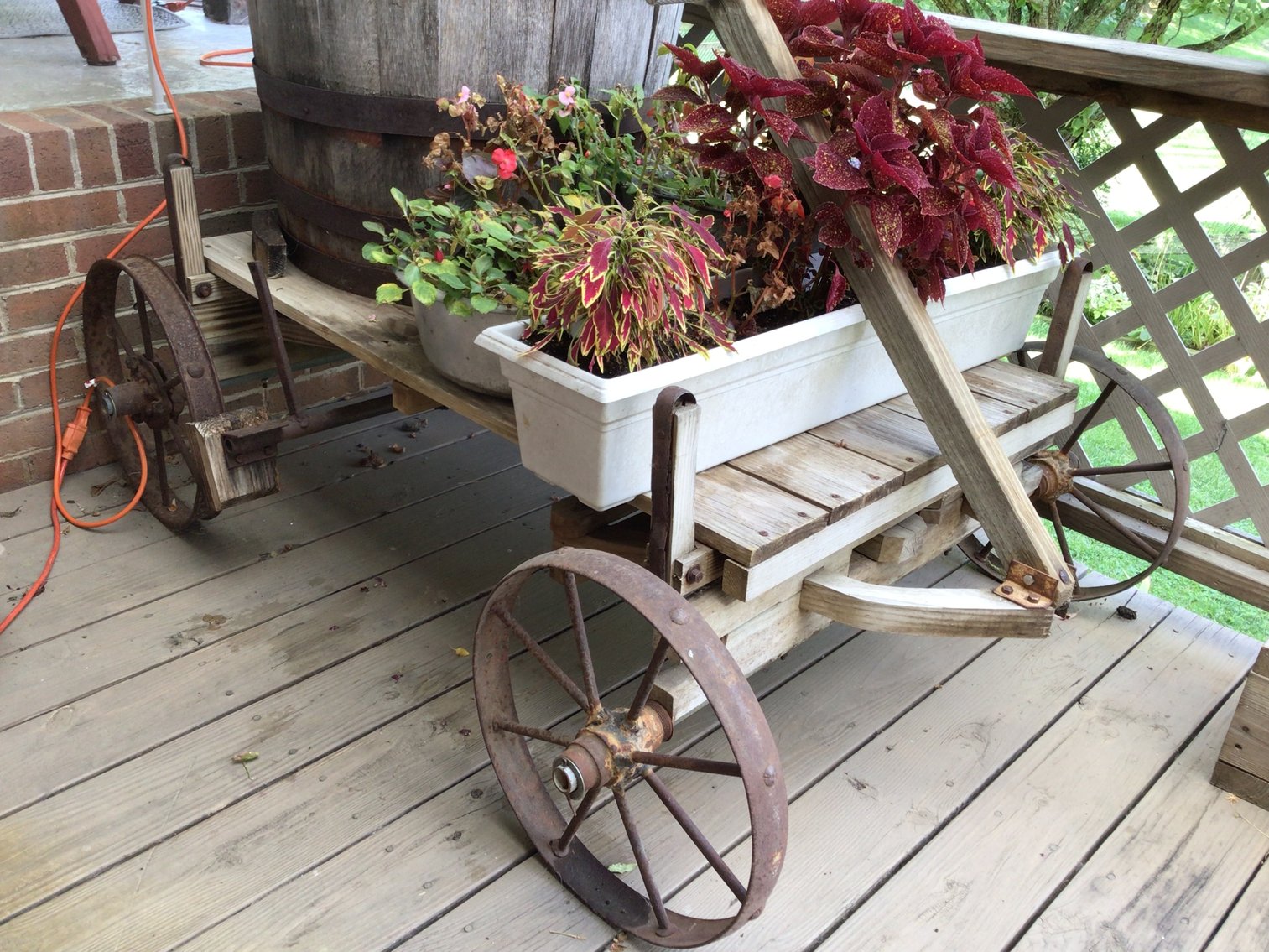 Image for Fountain made from half wine barrel and hand pump