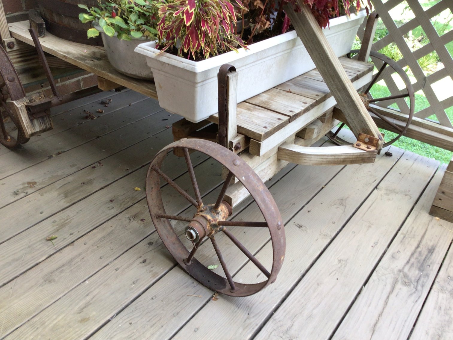 Image for Fountain made from half wine barrel and hand pump