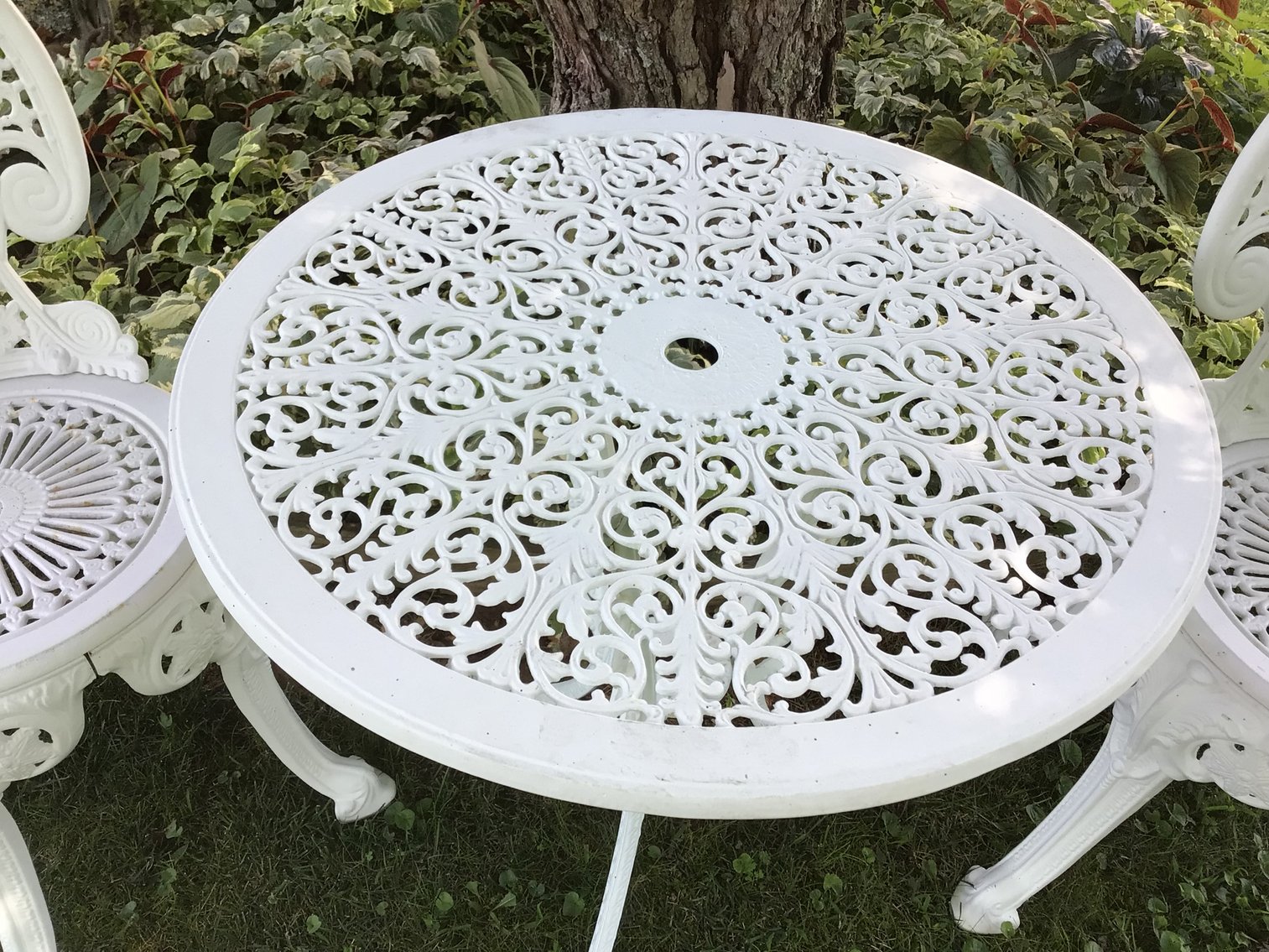 Image for Wrought iron table and two chairs,