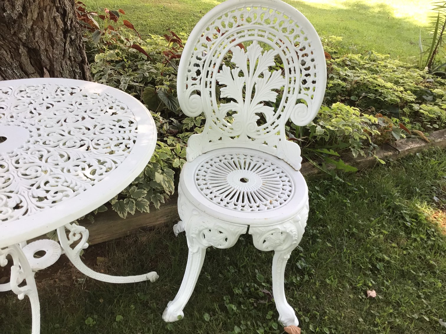 Image for Wrought iron table and two chairs,