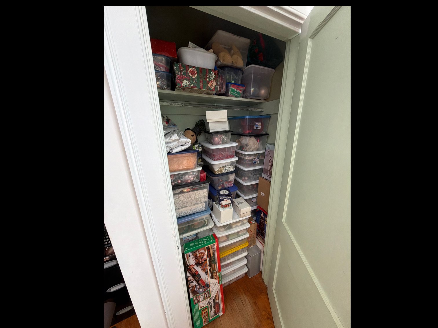 Image for Contents of closet. Christmas decorations.