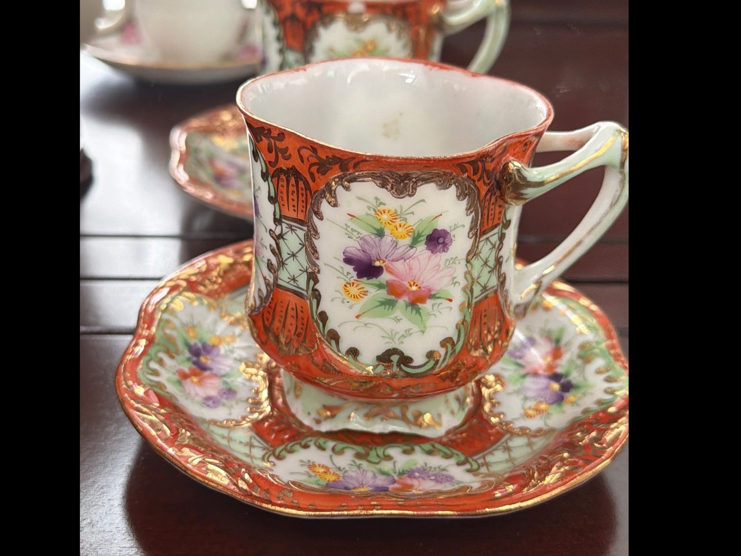 Image for Five hand painted cups and saucers