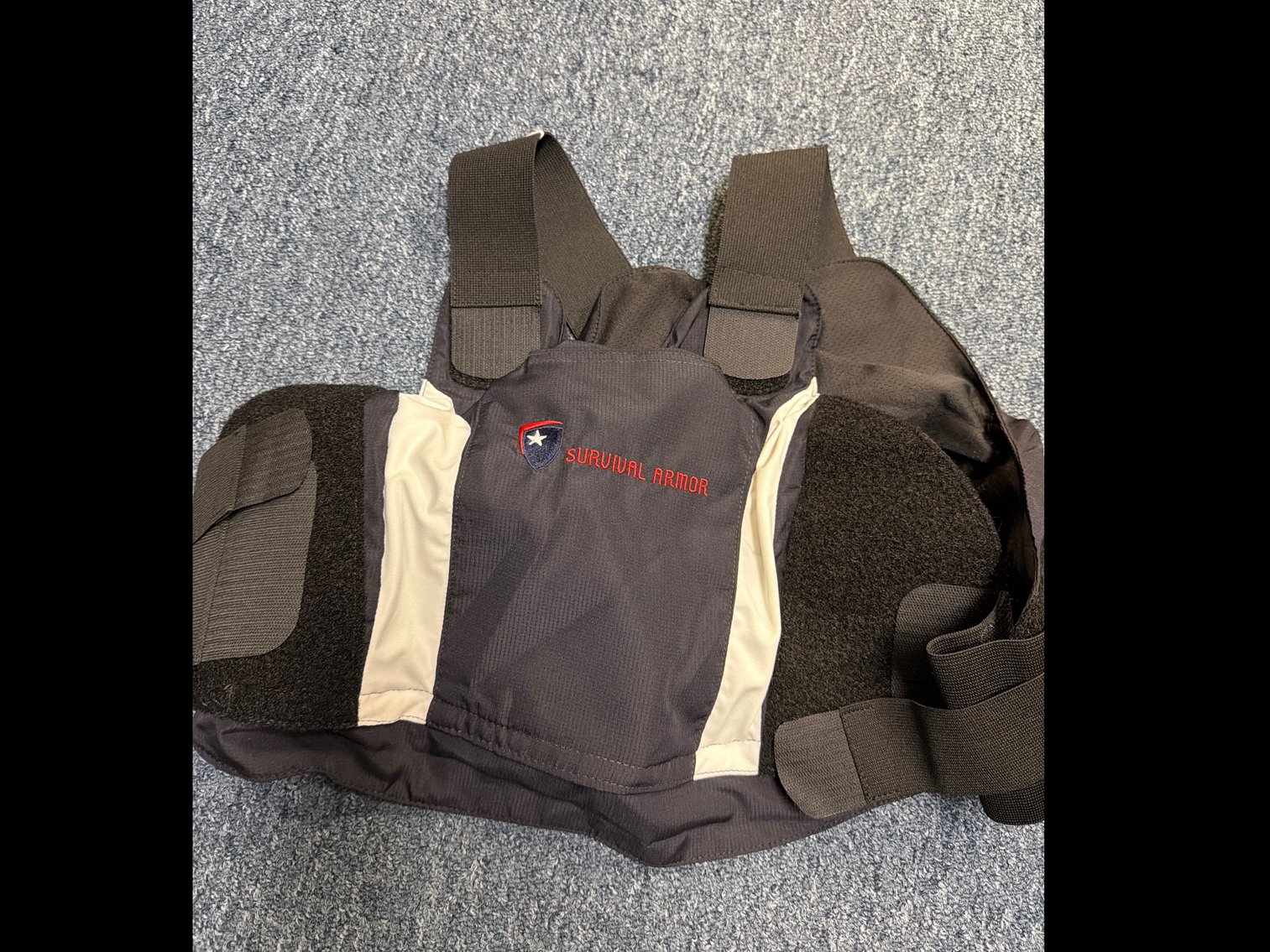 Image for Protection Vest. 3 each and Rack