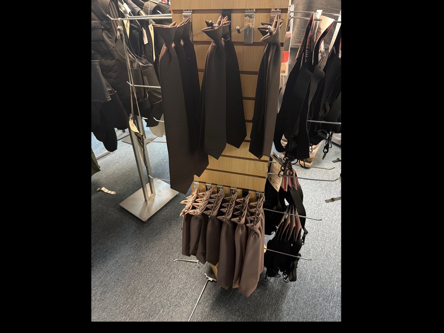 Image for Rack with miscellaneous items, ties, and belt suspenders