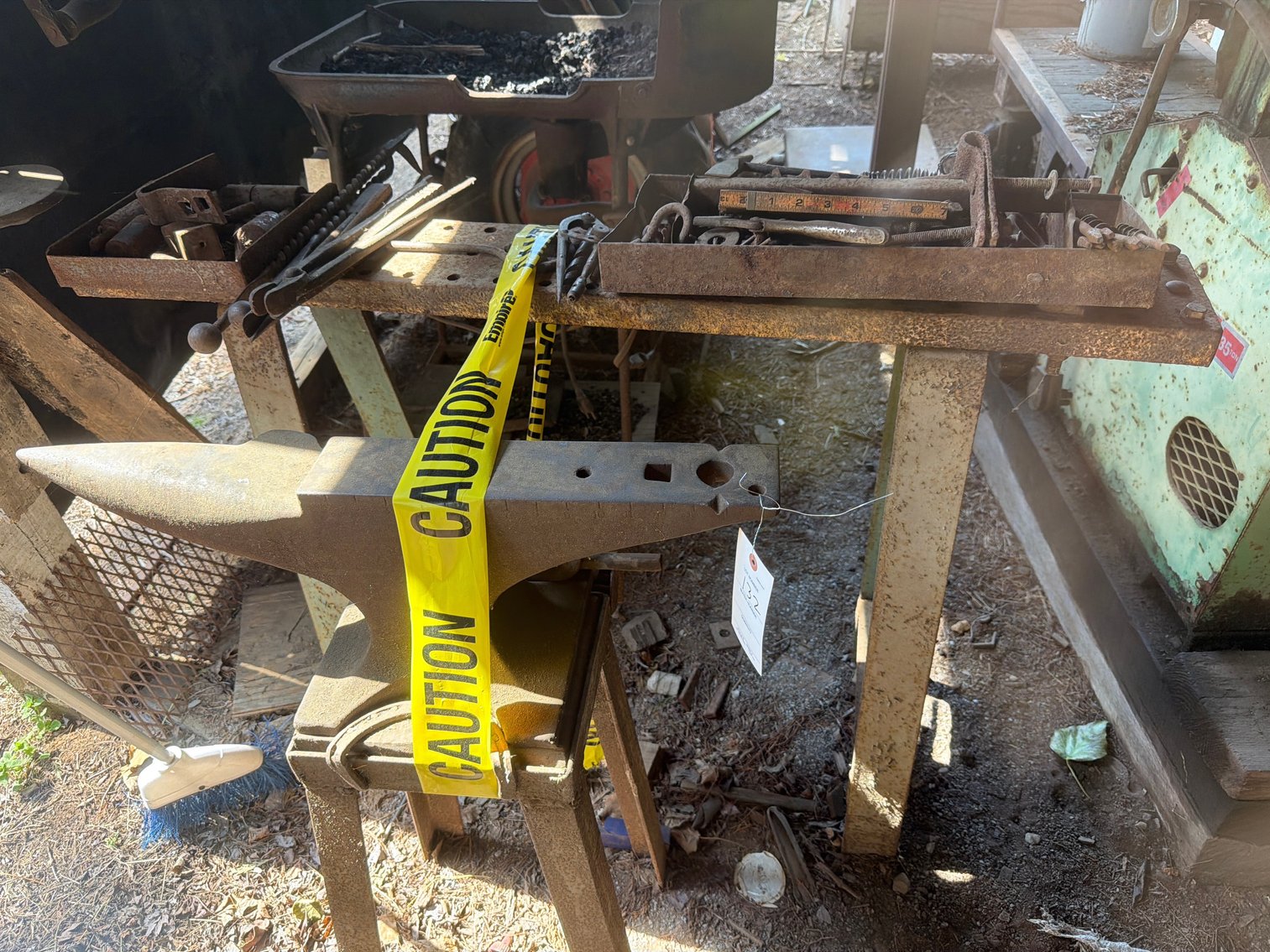 Image for Anvil, metal sawhorse and tools