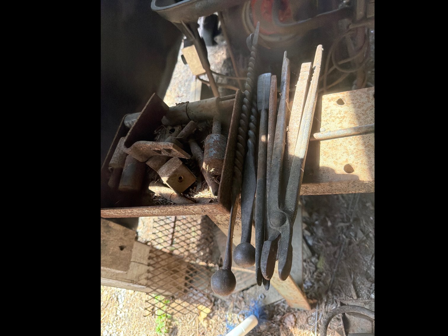 Image for Anvil, metal sawhorse and tools