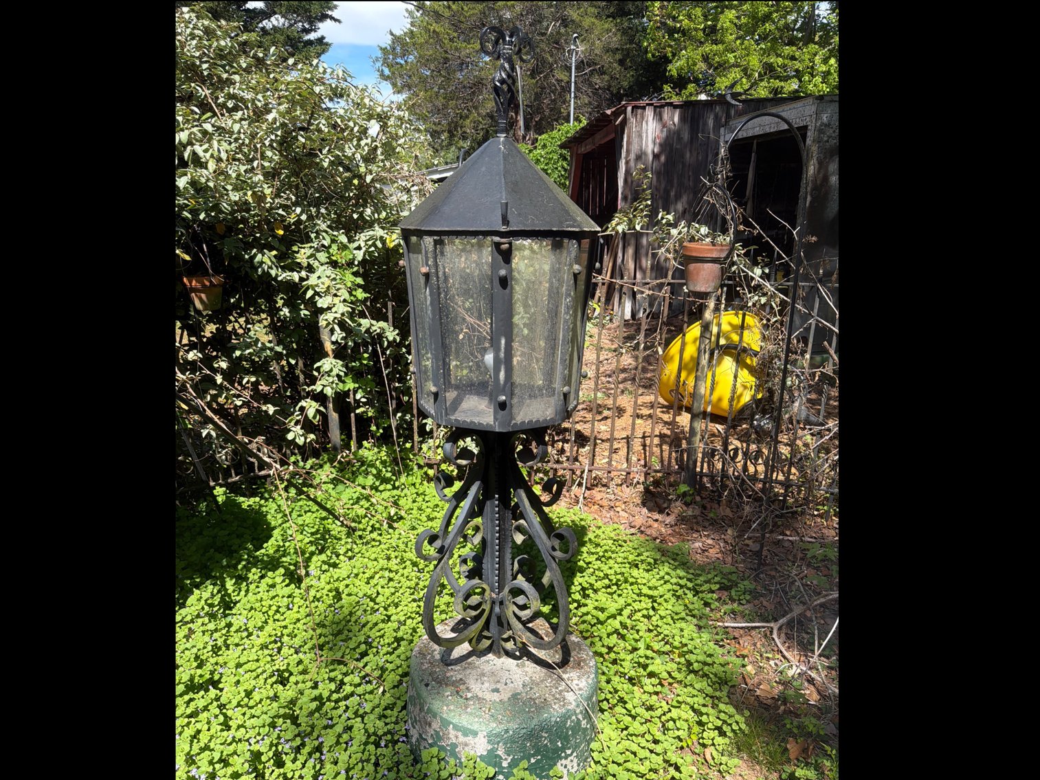 Image for Ornamental lamp on cement pedestal