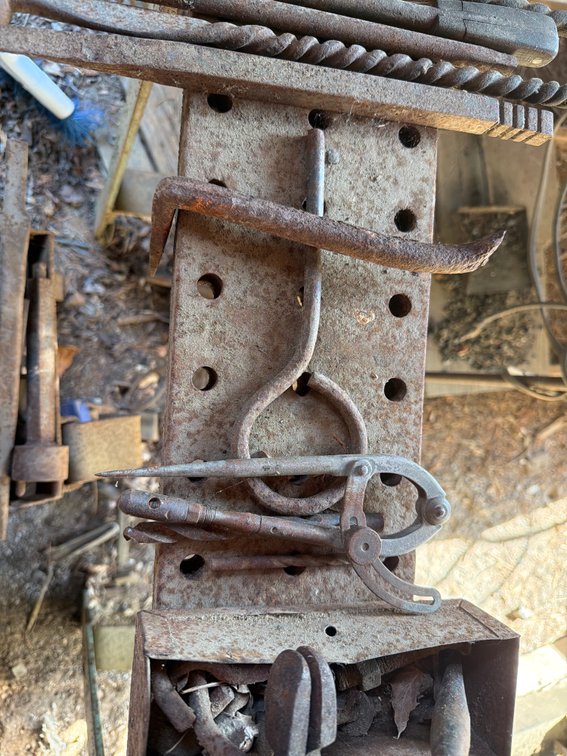 Image for Anvil, metal sawhorse and tools