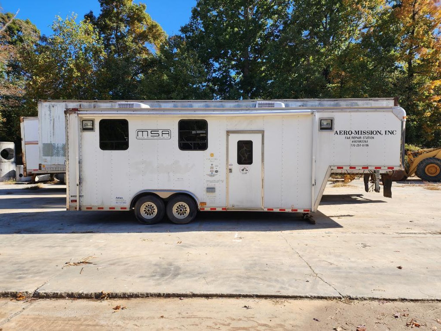 Image for Cat Loader & Pace Enclosed Trailer