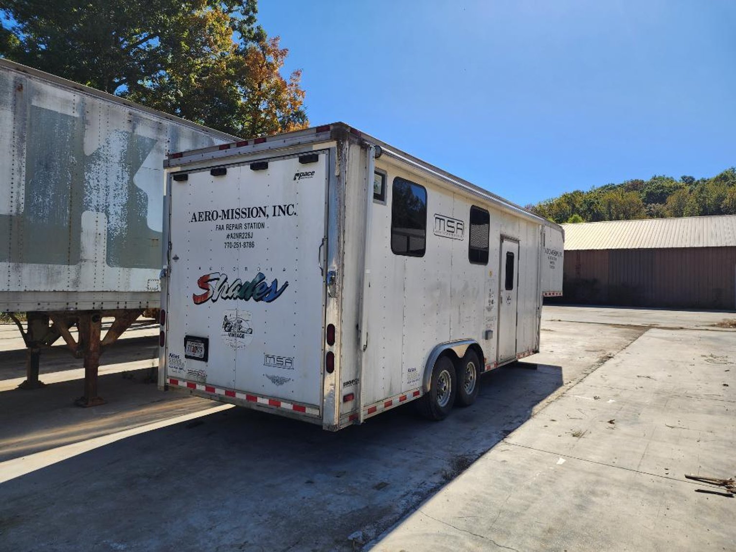 Image for Cat Loader & Pace Enclosed Trailer