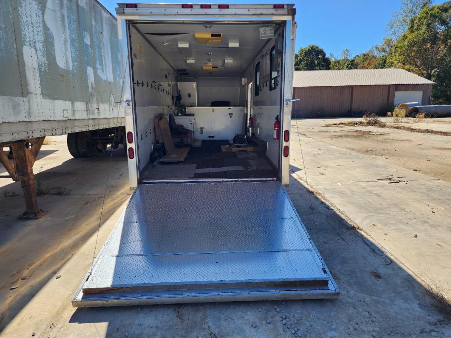 Image for Cat Loader & Pace Enclosed Trailer
