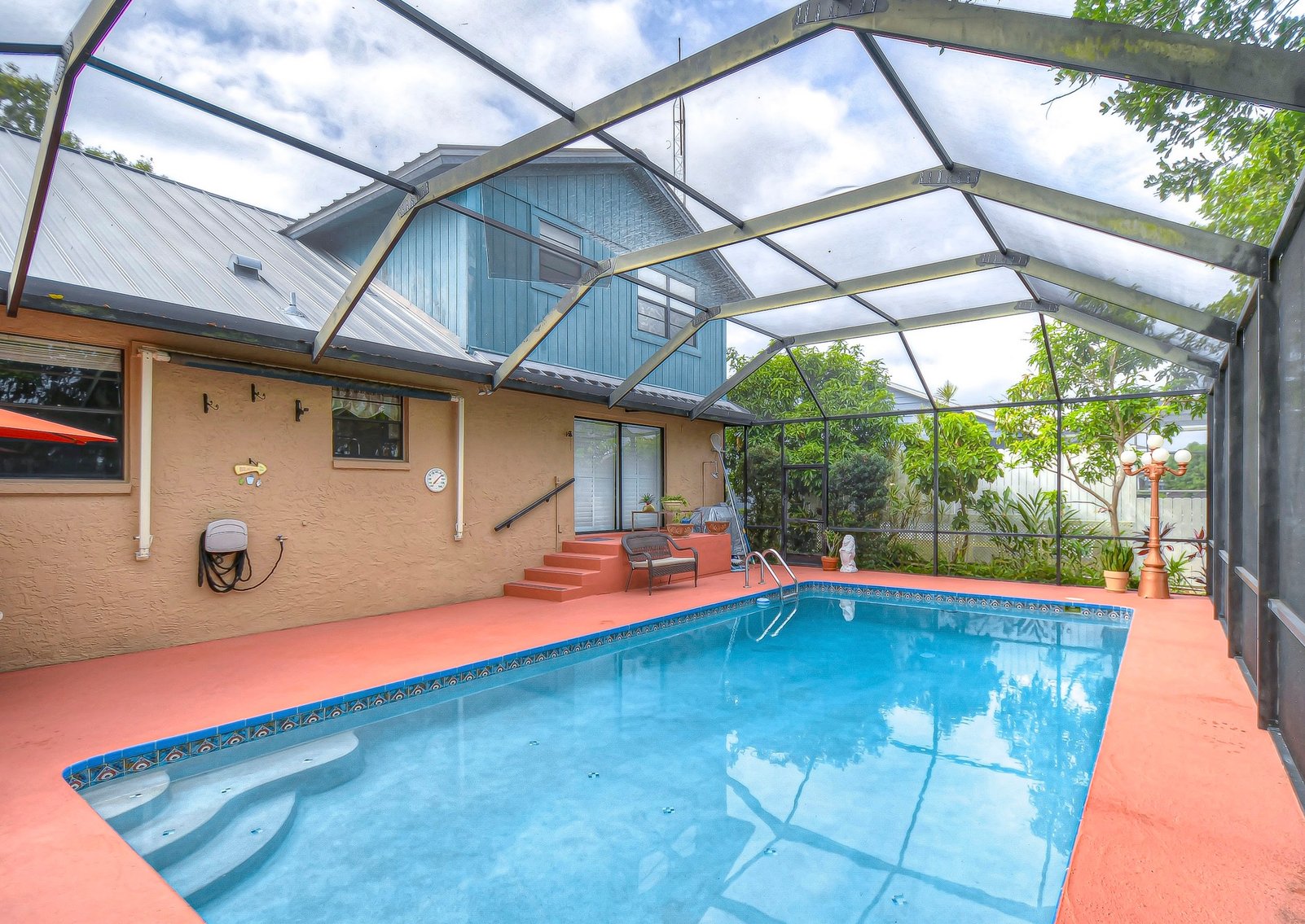 Image for For Sale ONLY at AUCTION this Waterfront 3BR/2.5BA Pool Home with Dock Just Minutes by Boat to Tampa Bay!