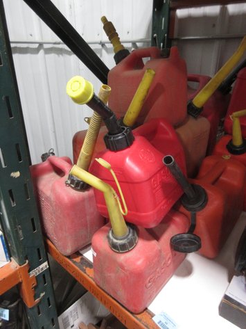 Image for Group of red plastic gas cans