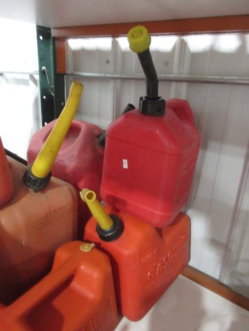 Image for Group of red plastic gas cans