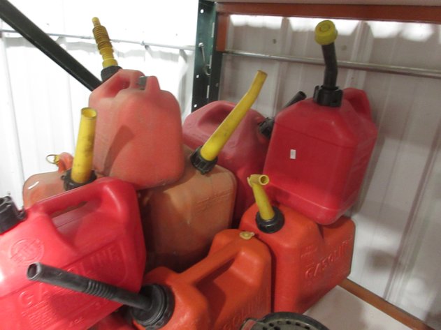 Image for Group of red plastic gas cans