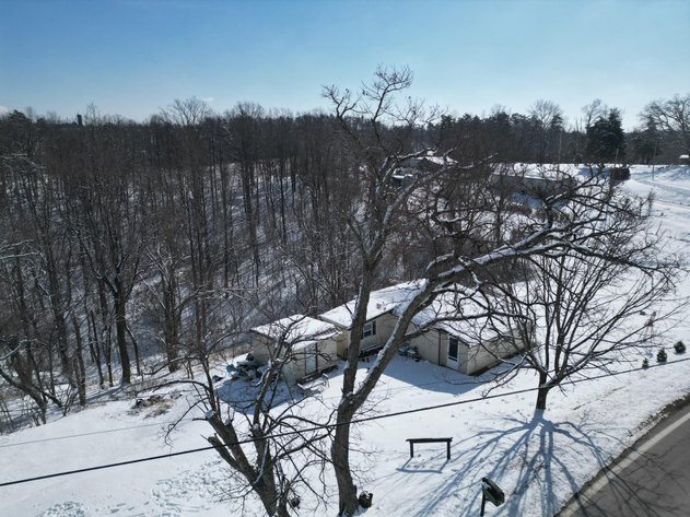 Image for SOLD $49,500 - Secluded 7.48-Acre Getaway Property with Cabin, Home & Trails in Mason County