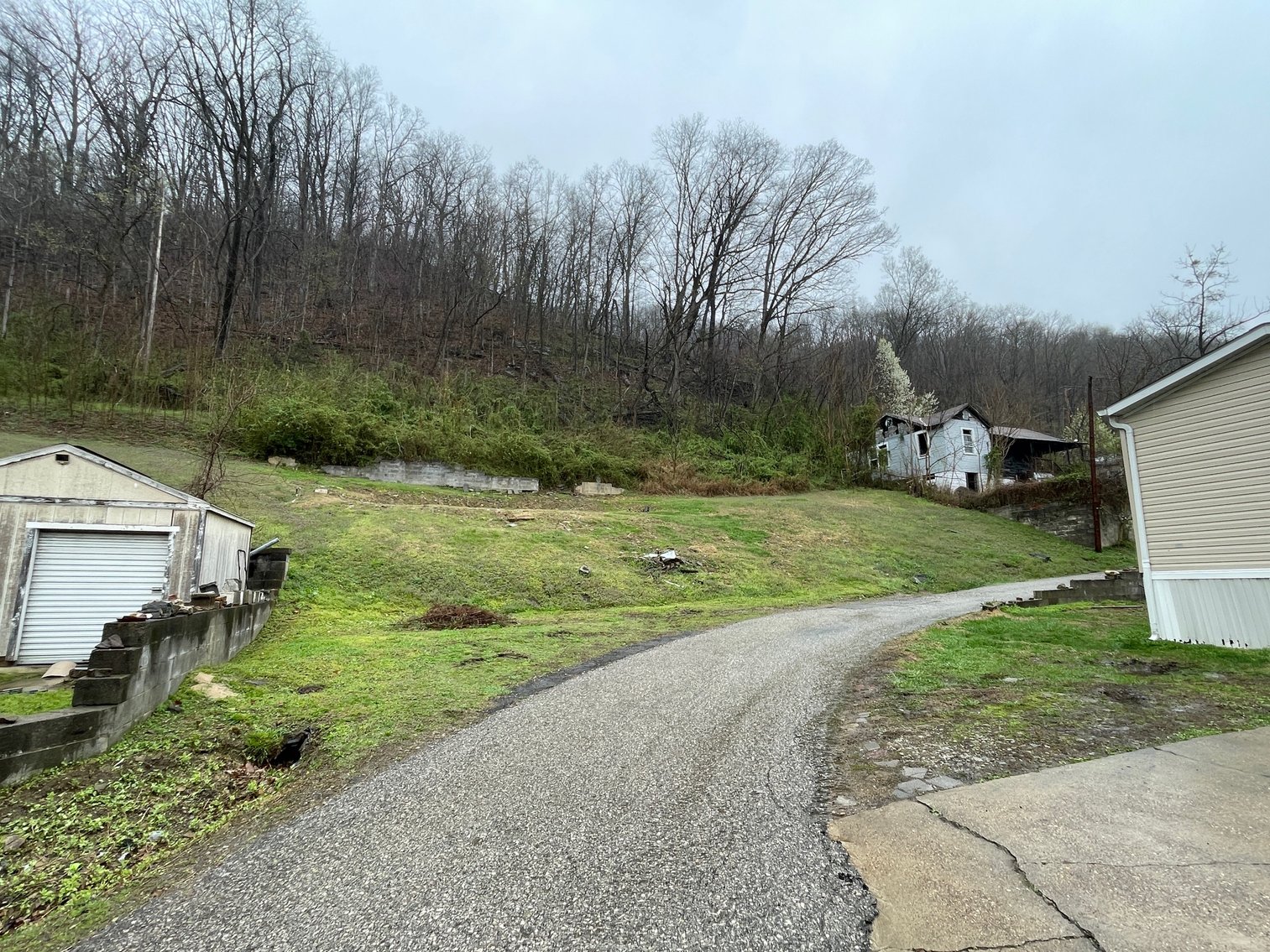 Image for SOLD $46,200 - 2 Bedroom on Nearly an Acre with River Views Along US-60 in Fayette County