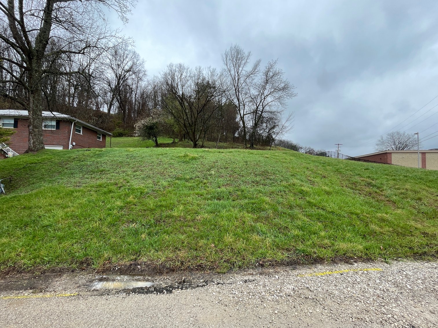 Image for SOLD $107,360 - Income Generating Brick 3 Bedroom on 1.8 Acres in the South Hills of Charleston