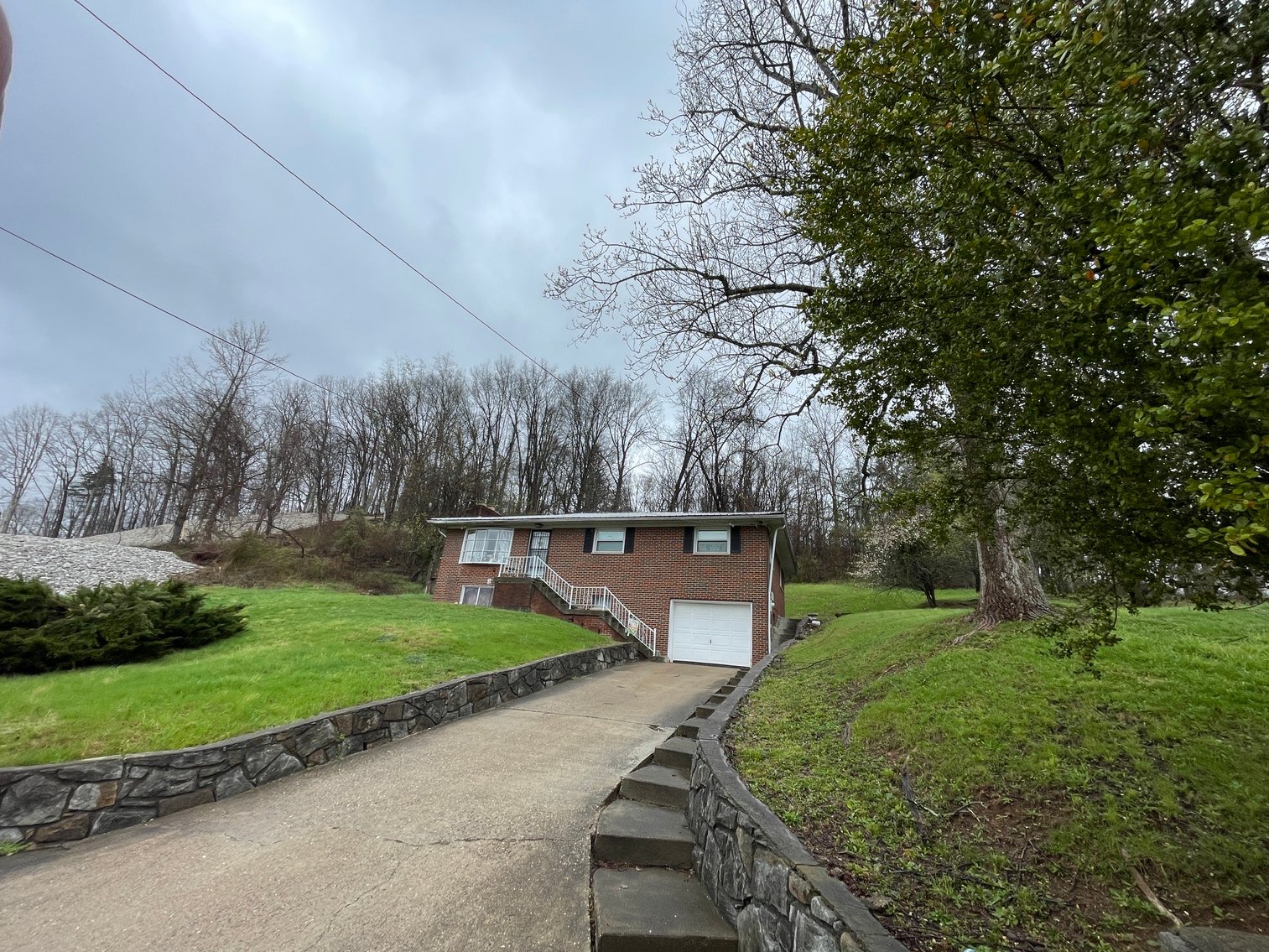 Image for SOLD $107,360 - Income Generating Brick 3 Bedroom on 1.8 Acres in the South Hills of Charleston