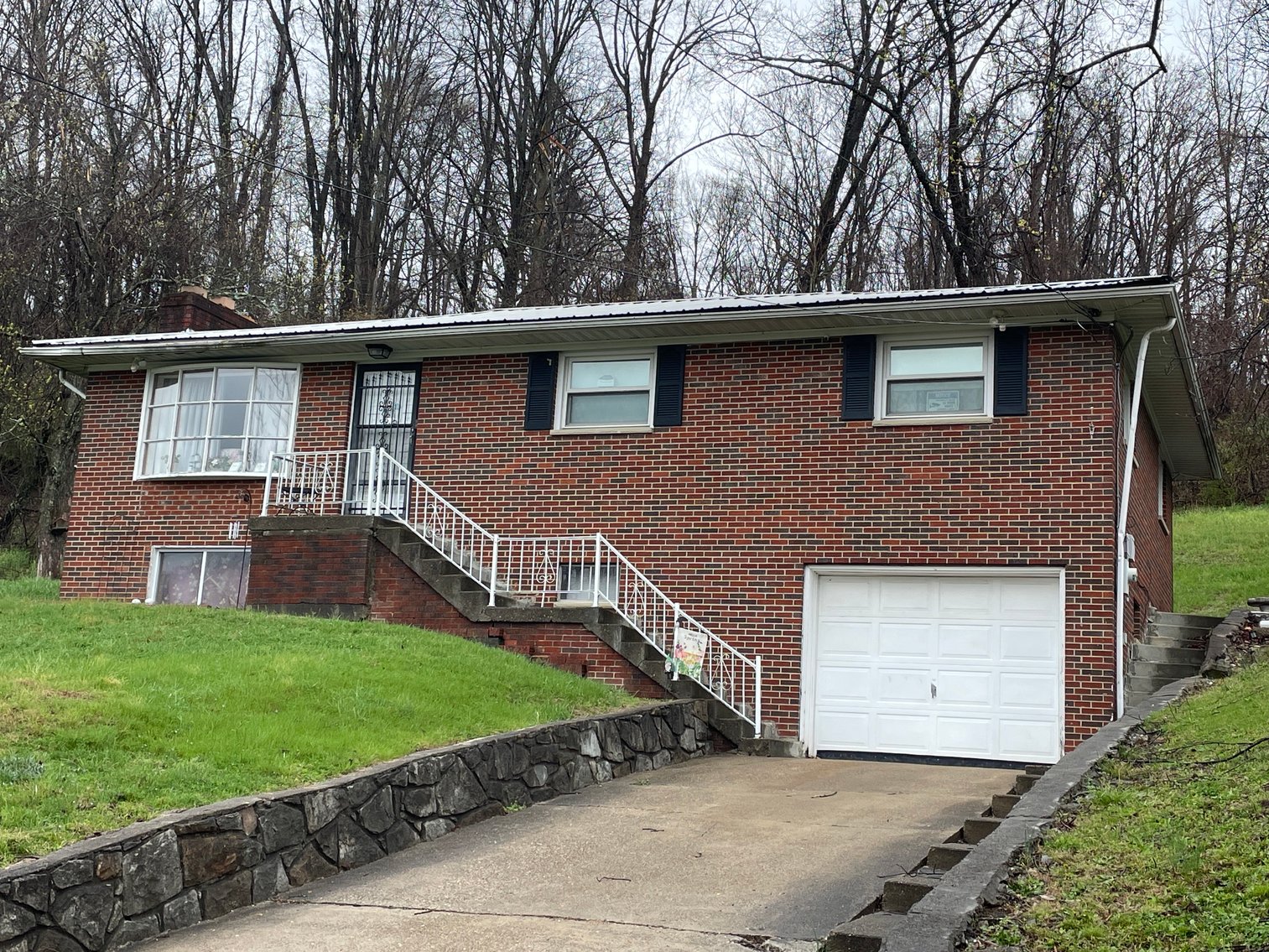 Image for SOLD $107,360 - Income Generating Brick 3 Bedroom on 1.8 Acres in the South Hills of Charleston