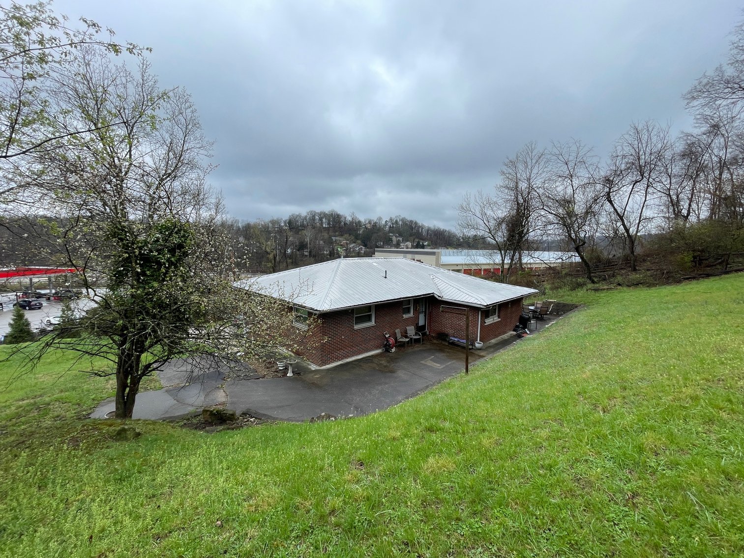 Image for SOLD $107,360 - Income Generating Brick 3 Bedroom on 1.8 Acres in the South Hills of Charleston