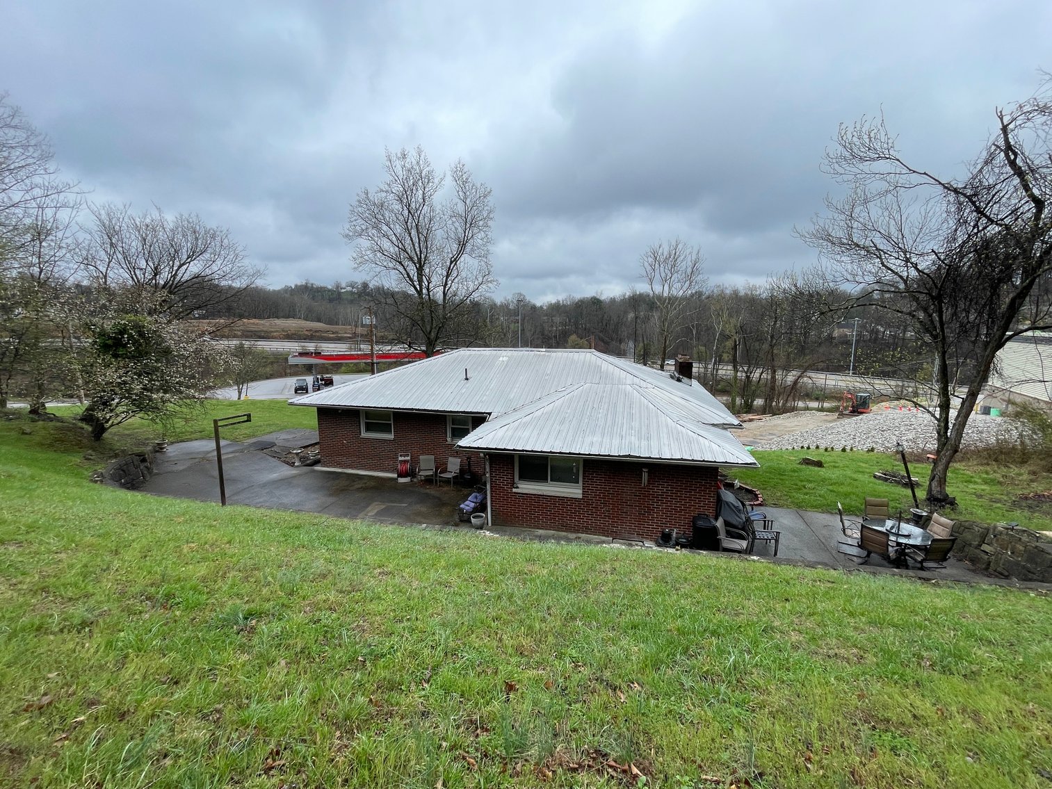 Image for SOLD $107,360 - Income Generating Brick 3 Bedroom on 1.8 Acres in the South Hills of Charleston