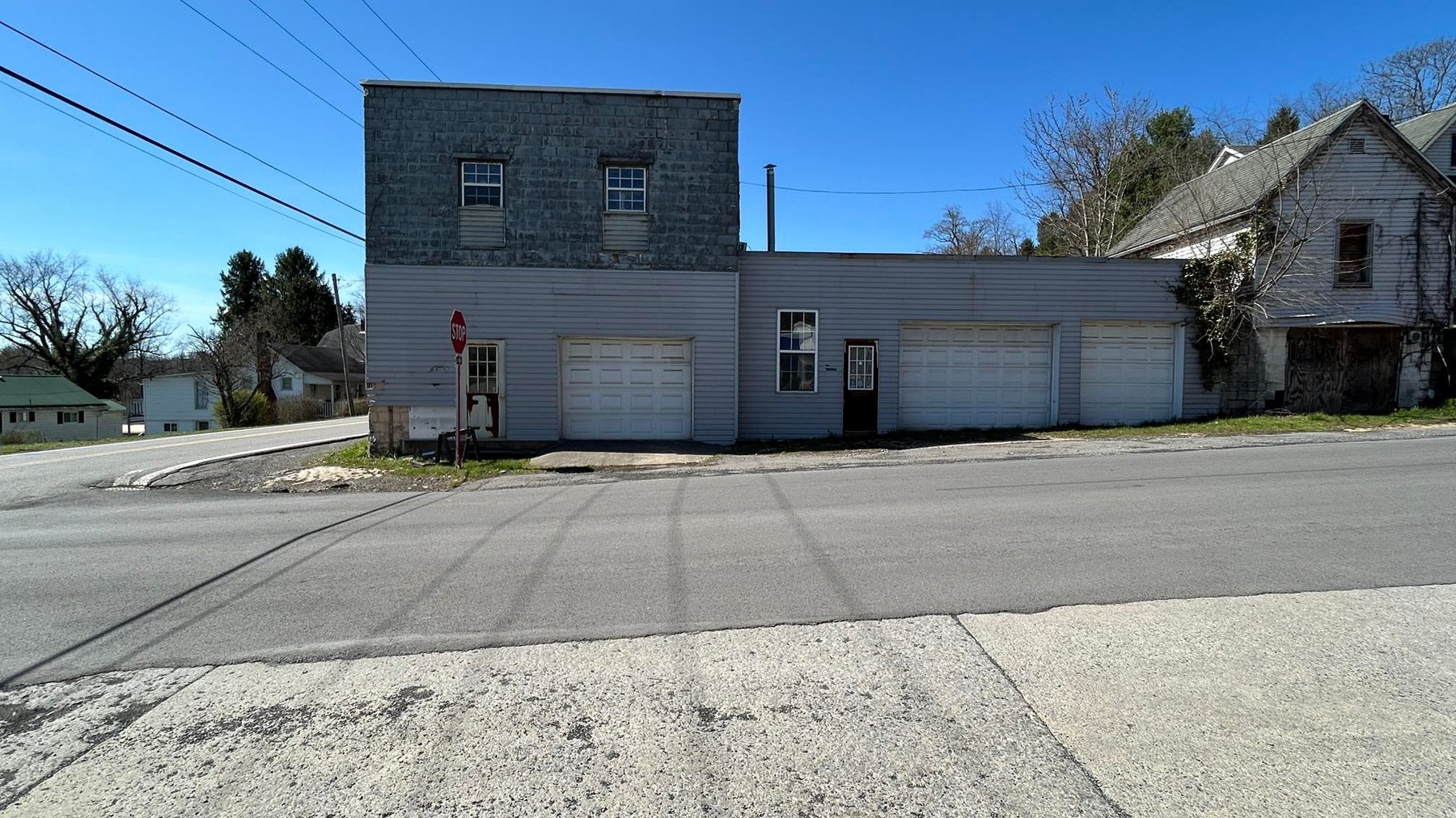Image for SOLD $63,800 - Commercial Building with Garage Bays & Apartment Selling to the Highest Bidder