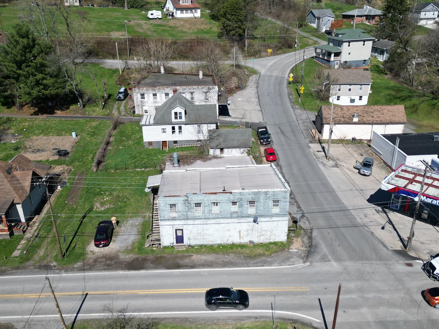 Image for SOLD $63,800 - Commercial Building with Garage Bays & Apartment Selling to the Highest Bidder