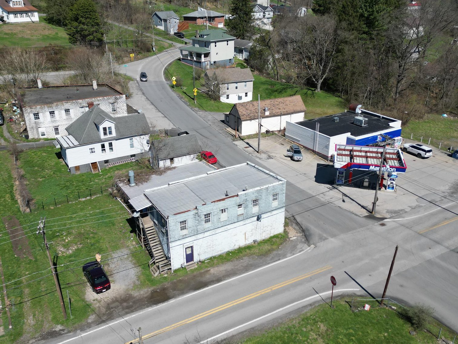 Image for SOLD $63,800 - Commercial Building with Garage Bays & Apartment Selling to the Highest Bidder